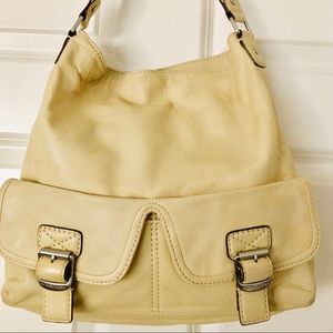 Gently used pale yellow MK shoulder bag.